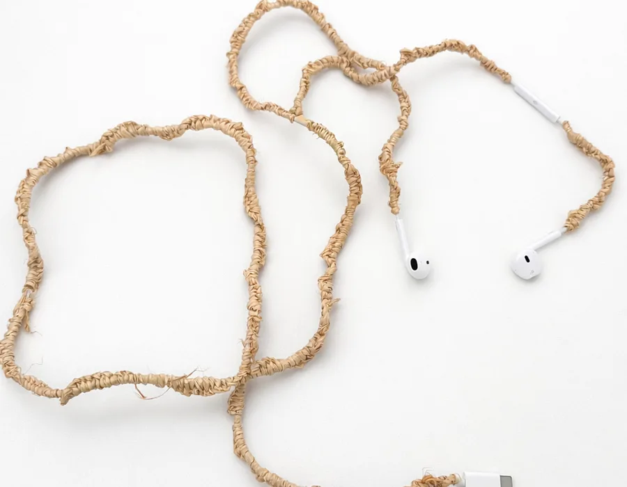 Benjamin Akuila Hearings 2025 earphones and raffia 1