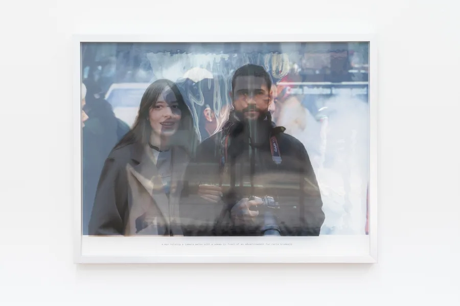 Johanna Ng a man holding a camera walks with a woman 2024 inkjet print on clear film and cotton rag 80 5 x 59 4 cm